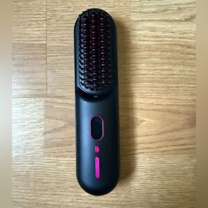 Sleek Black and Pink Hair Straightening Brush